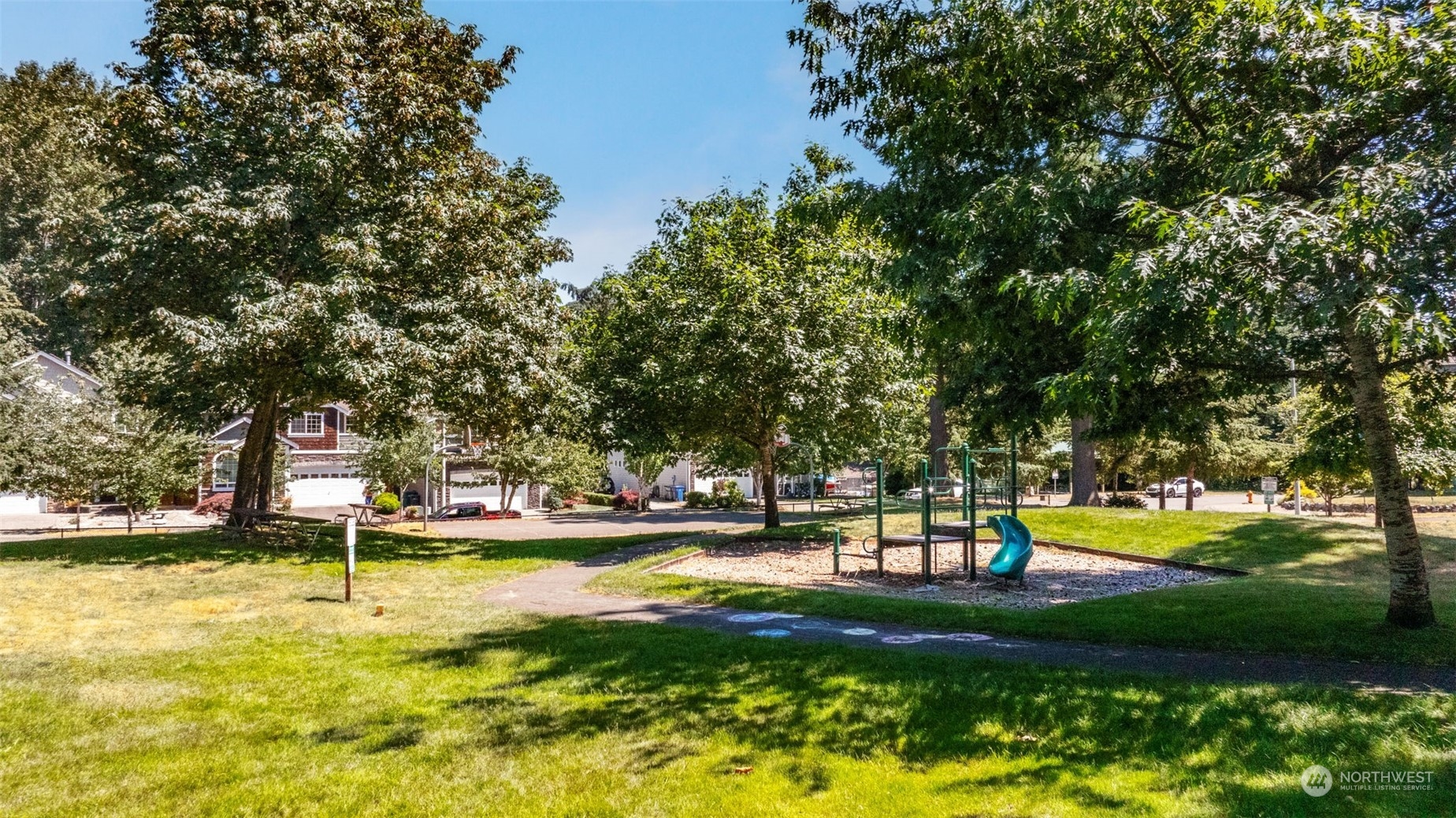 23825 17th Avenue West Bothell, WA 98021 - Photo 32 of 35 a view of a swimming pool with a garden