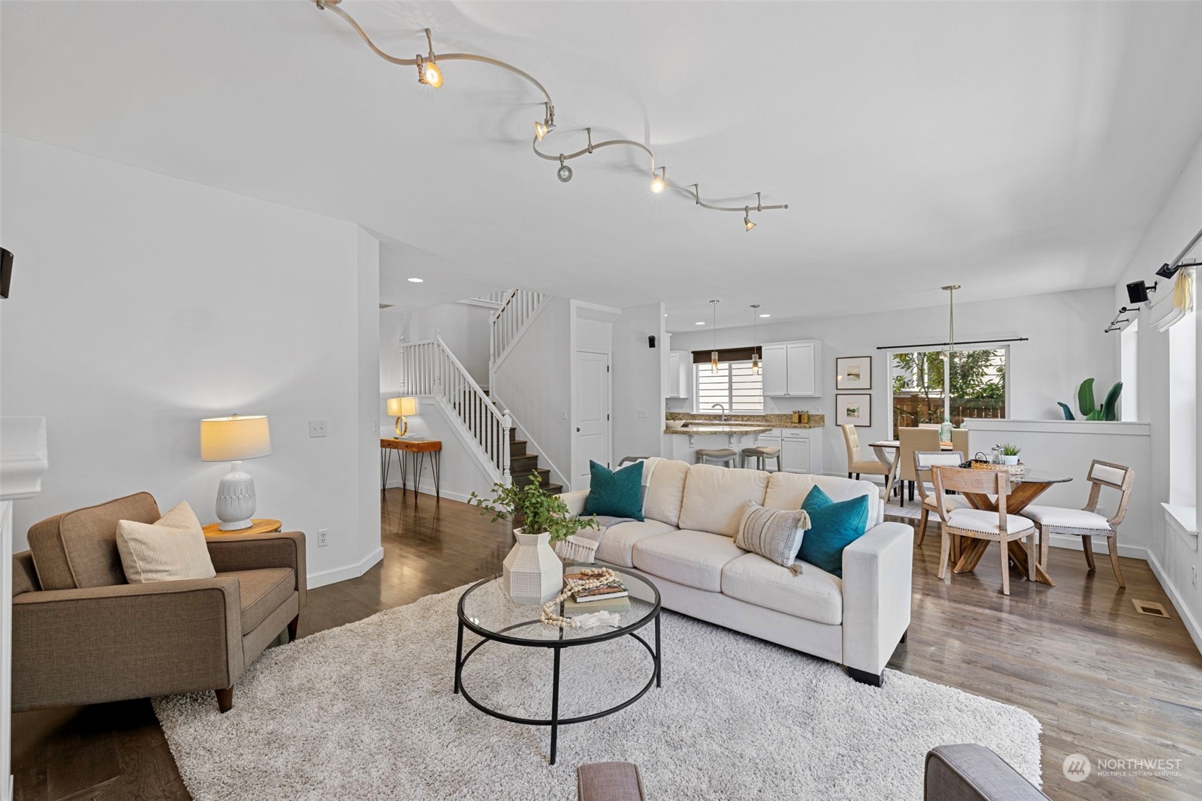 23825 17th Avenue West Bothell, WA 98021 - Photo 6 of 35 a living room with furniture and a table
