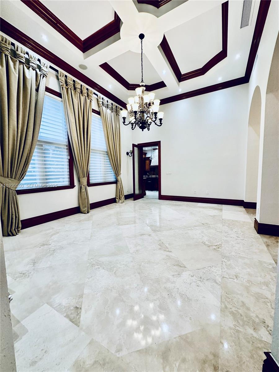 6180 Southwest 132nd Street Pinecrest, FL 33156 - Photo 11 of 75 a view of a livingroom with wooden floor and stairs
