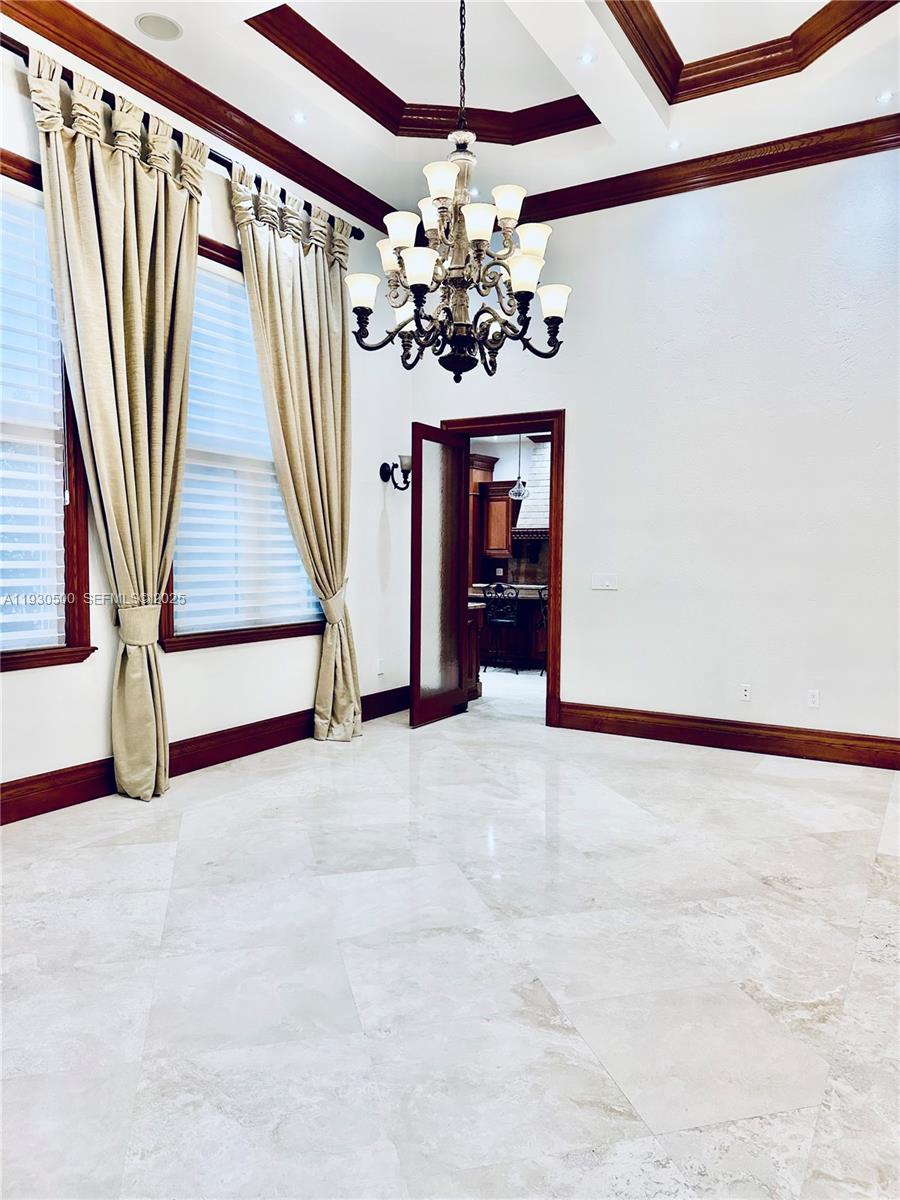 6180 Southwest 132nd Street Pinecrest, FL 33156 - Photo 12 of 75 a view of a livingroom with wooden floor and stairs