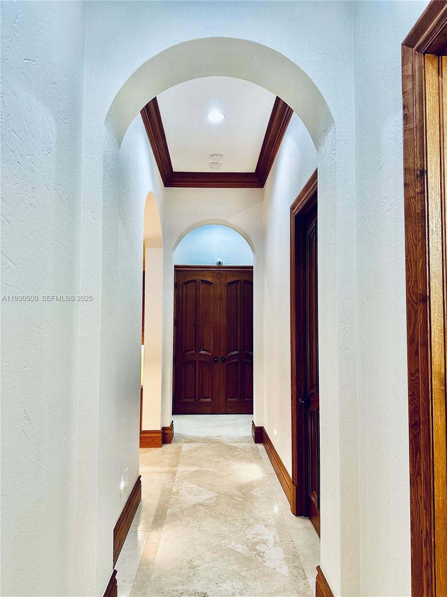 6180 Southwest 132nd Street Pinecrest, FL 33156 - Photo 13 of 75 a view of front door with a hallway