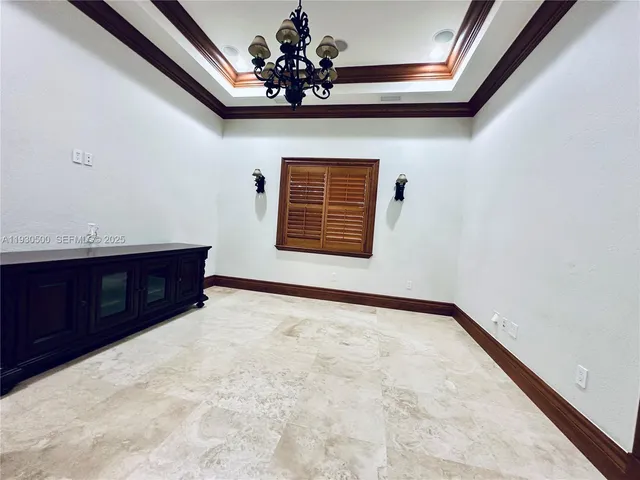 a bed room with furniture and a window