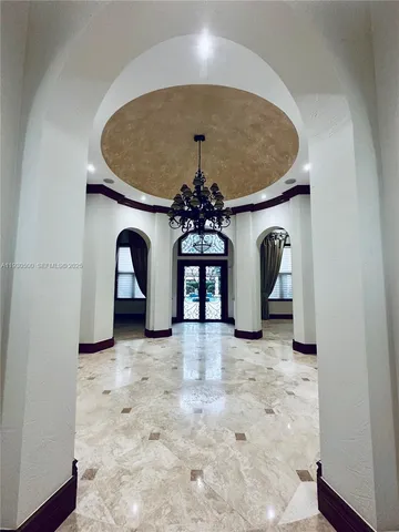 a view of entryway with a front door and entryway