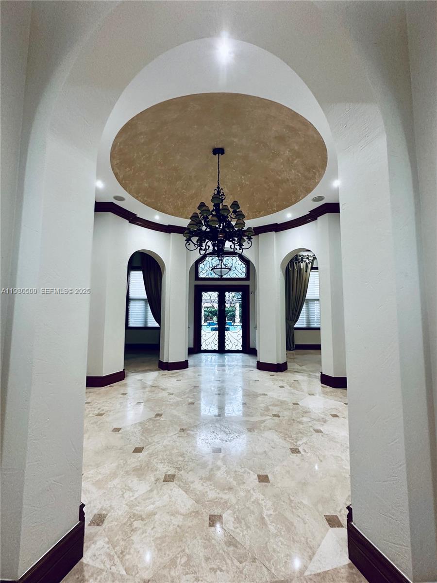 6180 Southwest 132nd Street Pinecrest, FL 33156 - Photo 4 of 75 a view of a room with a fireplace and window