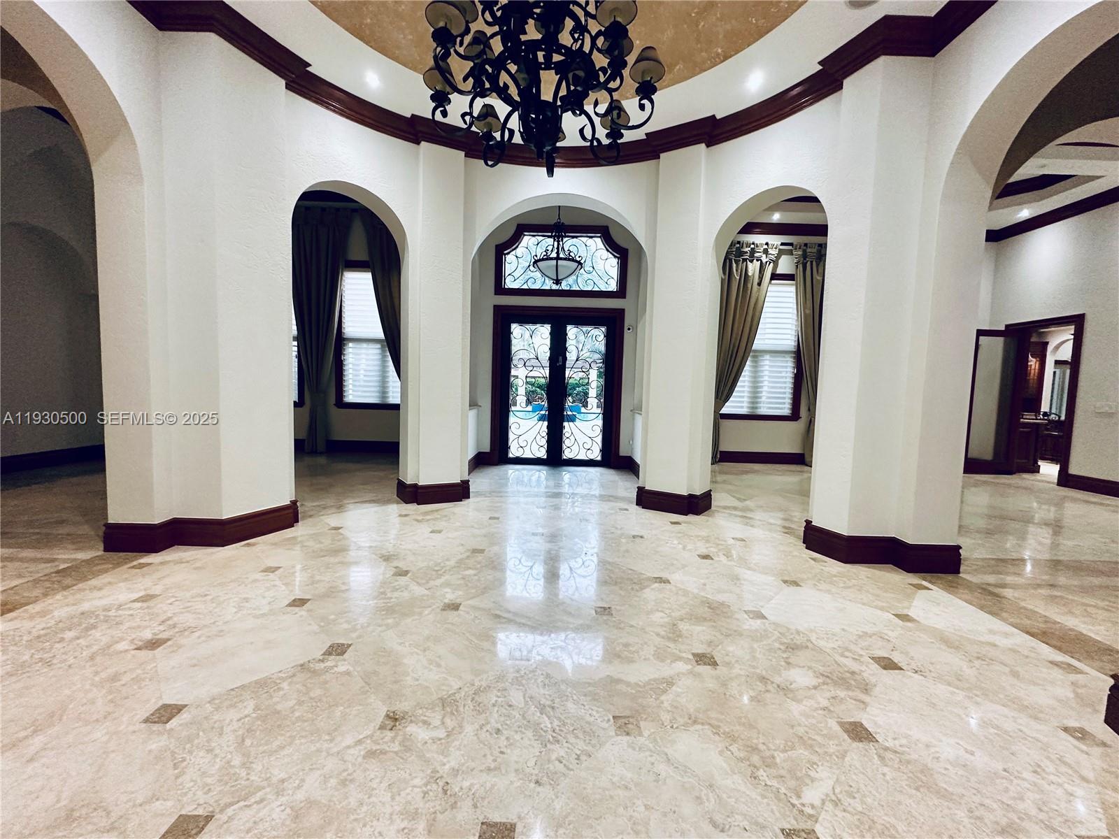 6180 Southwest 132nd Street Pinecrest, FL 33156 - Photo 5 of 75 a view of entryway with a front door and entryway