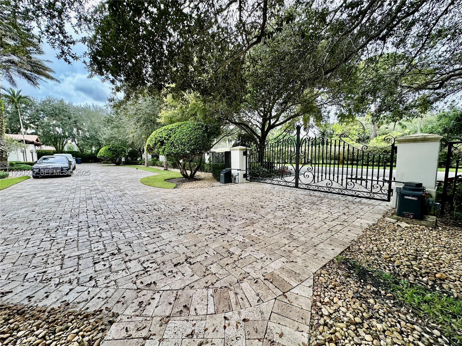 6180 Southwest 132nd Street Pinecrest, FL 33156 - Photo 71 of 75 a view of a park with large trees