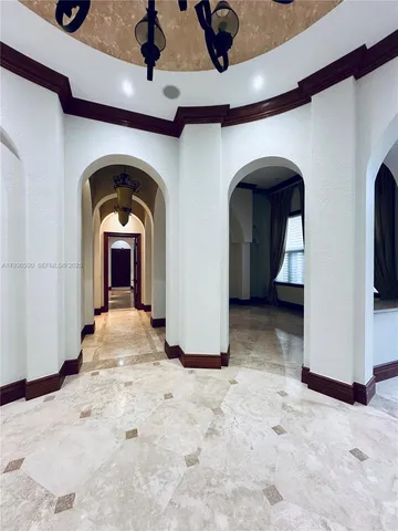 a view of front door with a hallway