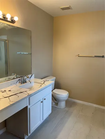 a white bath tub sitting next to a window