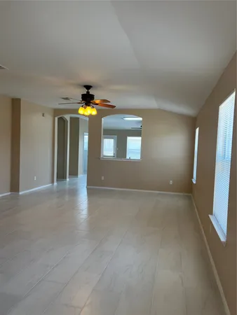 a view of a bathroom with a sink and window