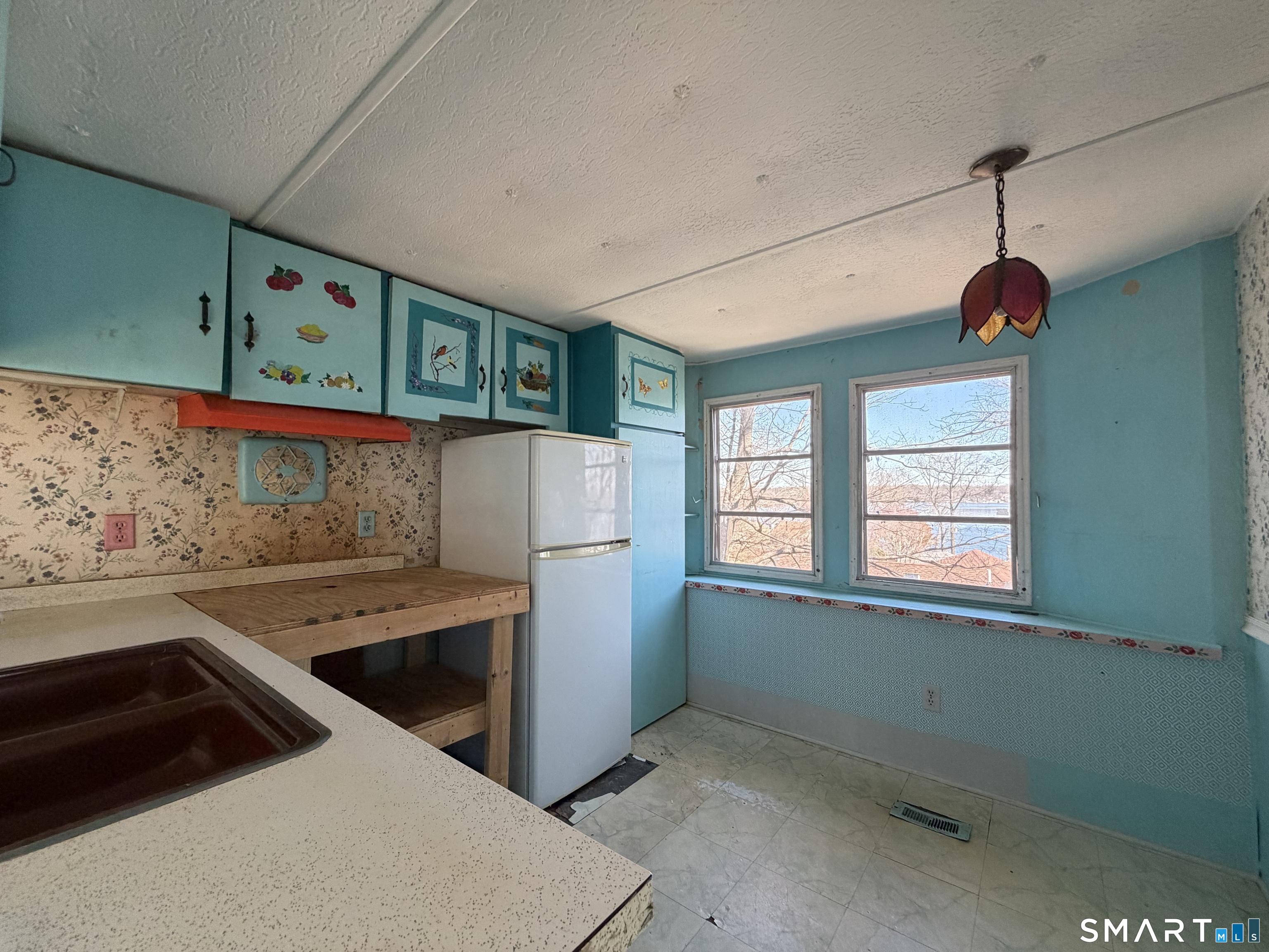 14 Mountainview Road East Hampton, CT 06424 - Photo 11 of 26 a kitchen with a sink a stove and a window