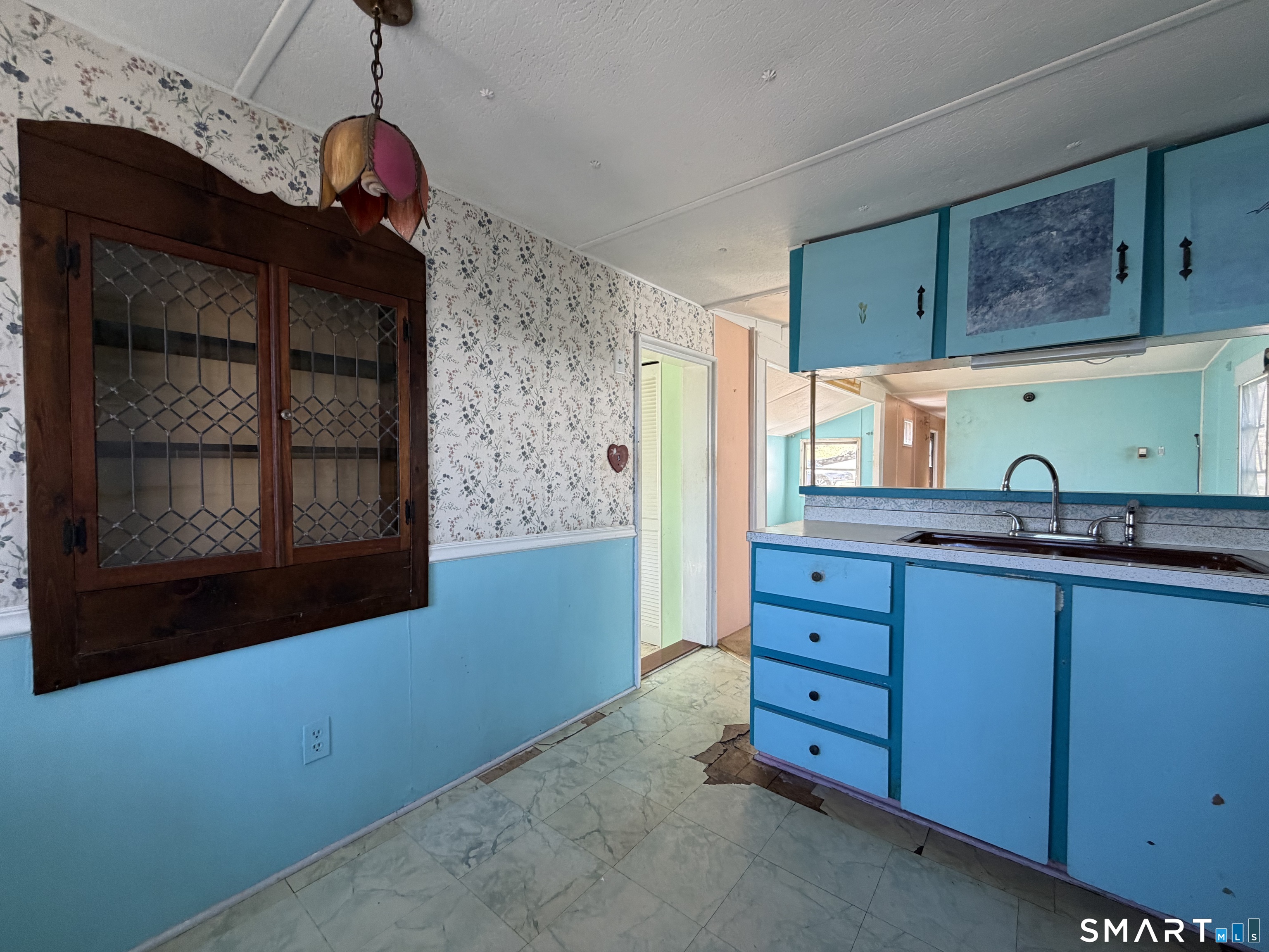 14 Mountainview Road East Hampton, CT 06424 - Photo 12 of 26 a kitchen with granite countertop cabinets and window