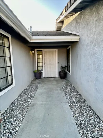 a view of a back yard of the house