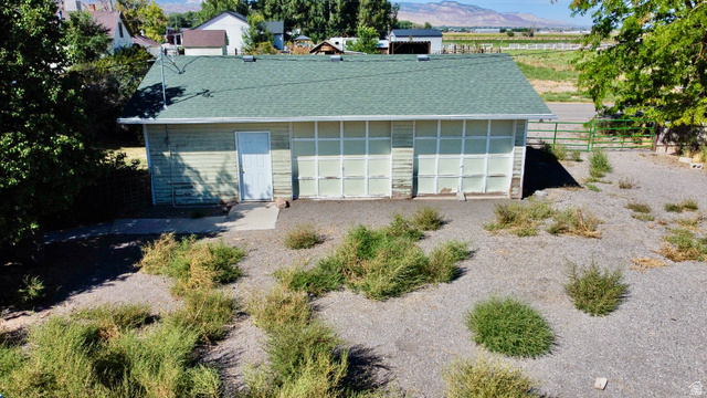 630 North Main Street Monroe, UT 84754 - Photo 42 of 63 Garage featuring a mountain view