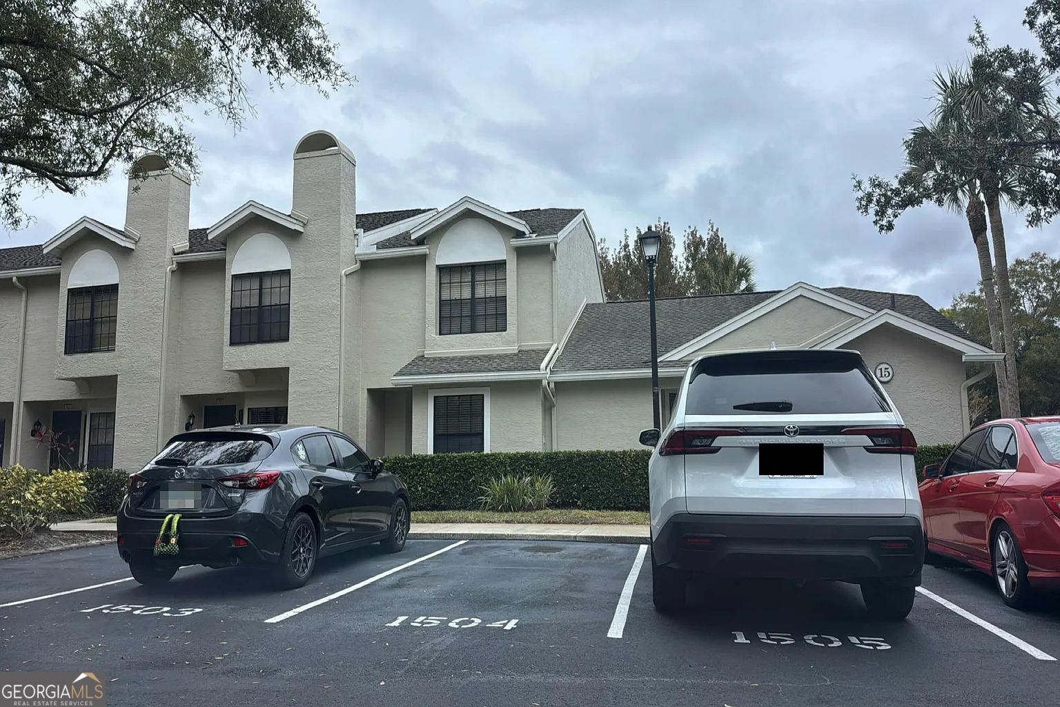 5100 Burchette Road, Unit 3404 Tampa, FL 33647 - Photo 2 of 5 a front view of a house with a parking space