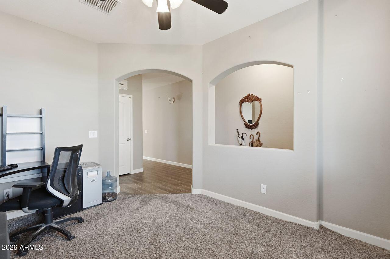 23602 West Ripple Road Buckeye, AZ 85326 - Photo 19 of 38 a view of room with workspace