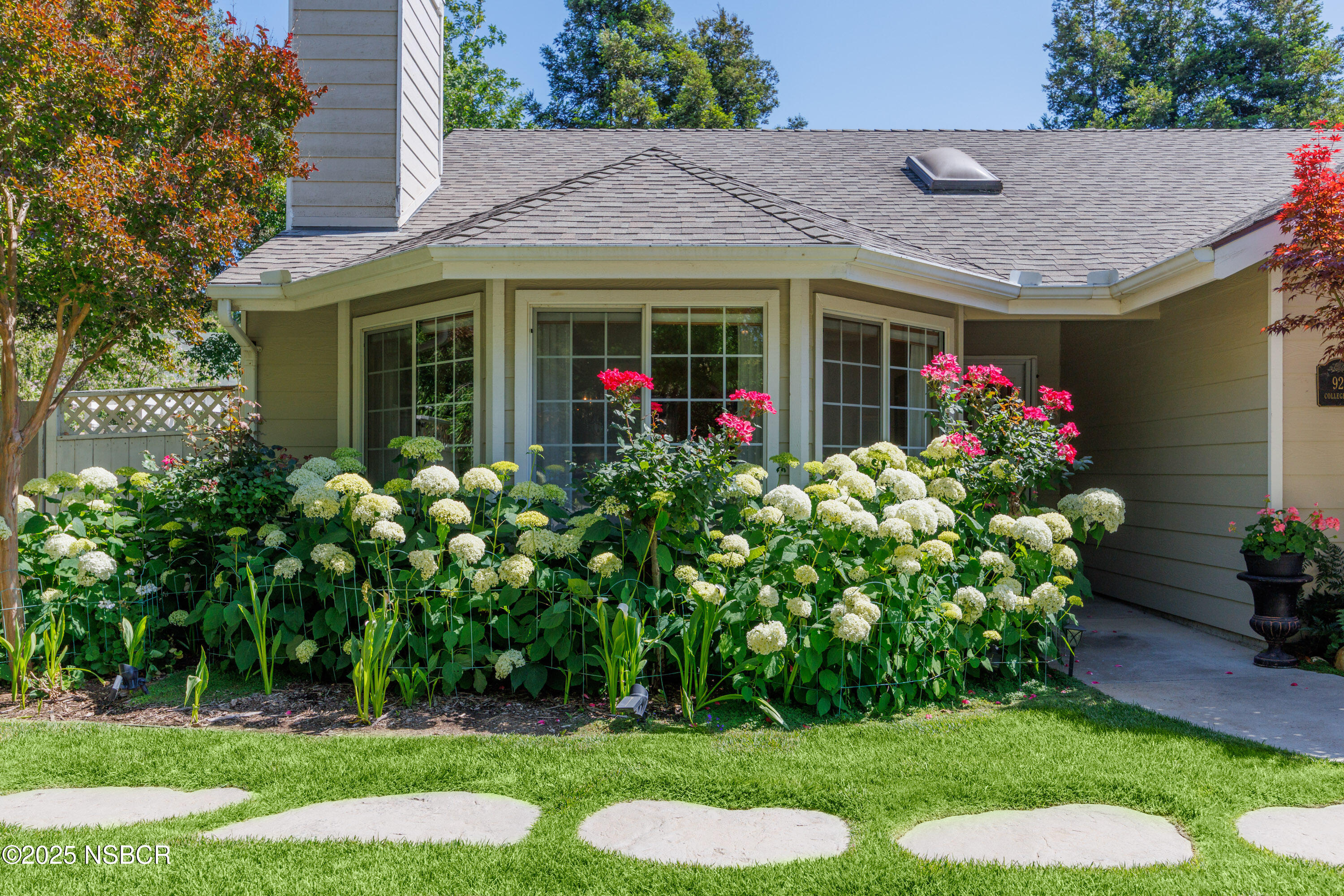 922 College Canyon Road Solvang, CA 93463 - Photo 2 of 23 a front view of a house with a yard