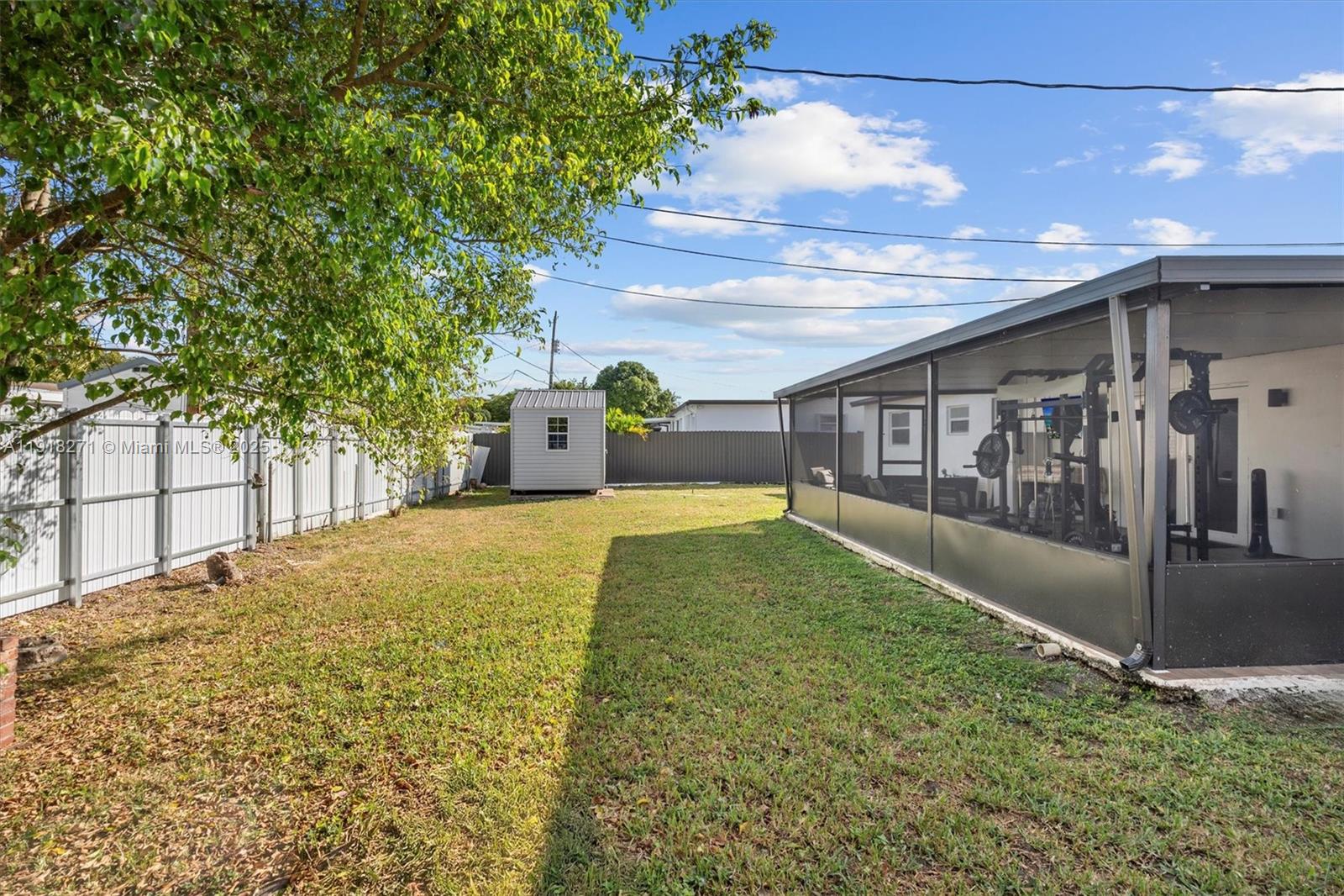 9411 Southwest 30th Terrace Miami, FL 33165 - Photo 25 of 42 a view of backyard with large trees