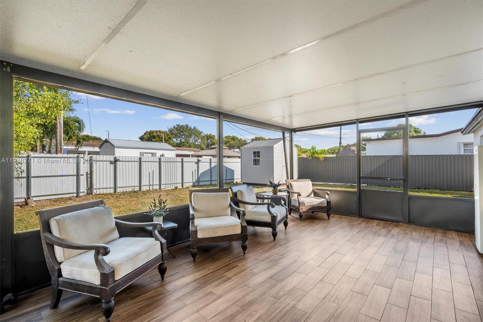 9411 Southwest 30th Terrace Miami, FL 33165 - Photo 29 of 42 a living room with furniture