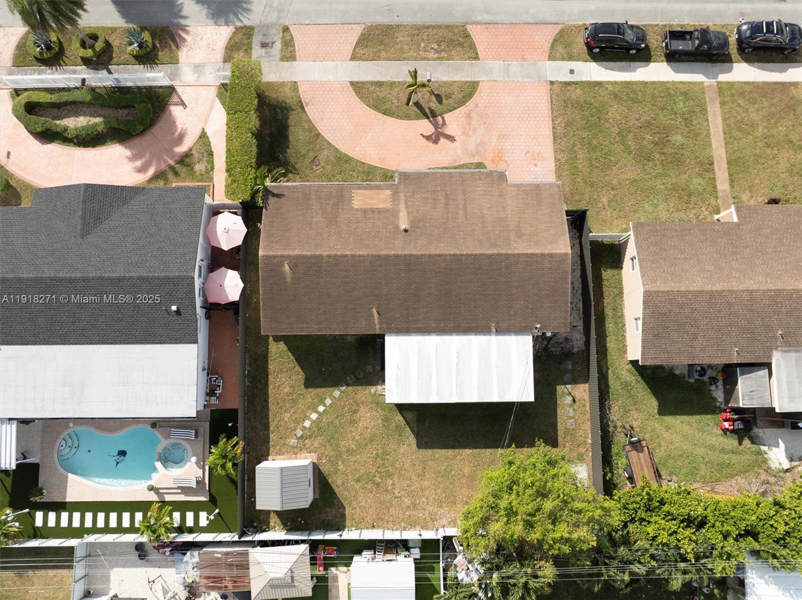 9411 Southwest 30th Terrace Miami, FL 33165 - Photo 32 of 42 an aerial view of residential houses with outdoor space