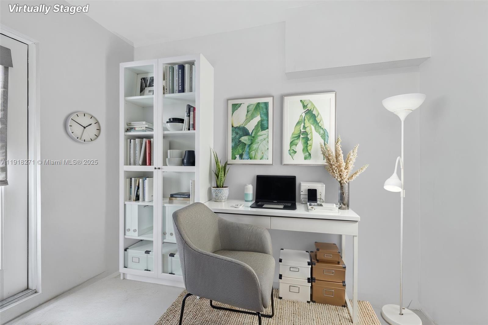 9411 Southwest 30th Terrace Miami, FL 33165 - Photo 39 of 42 a living room with furniture a window and a clock