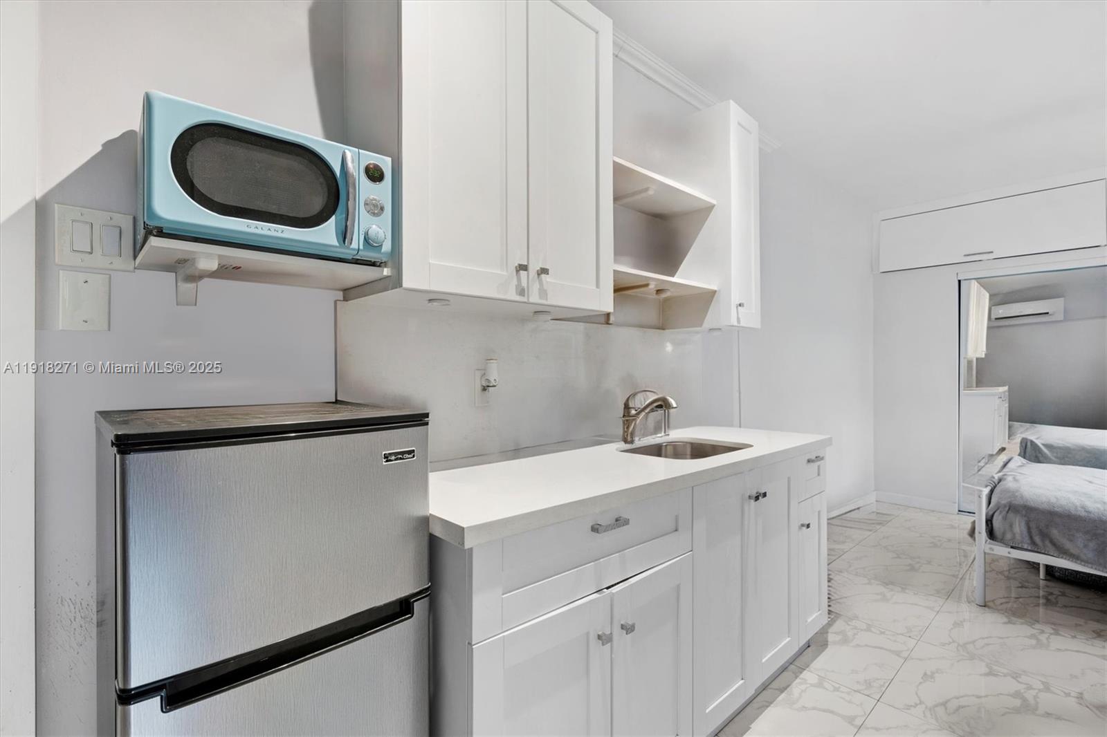 9411 Southwest 30th Terrace Miami, FL 33165 - Photo 40 of 42 a utility room with sink dryer and washer