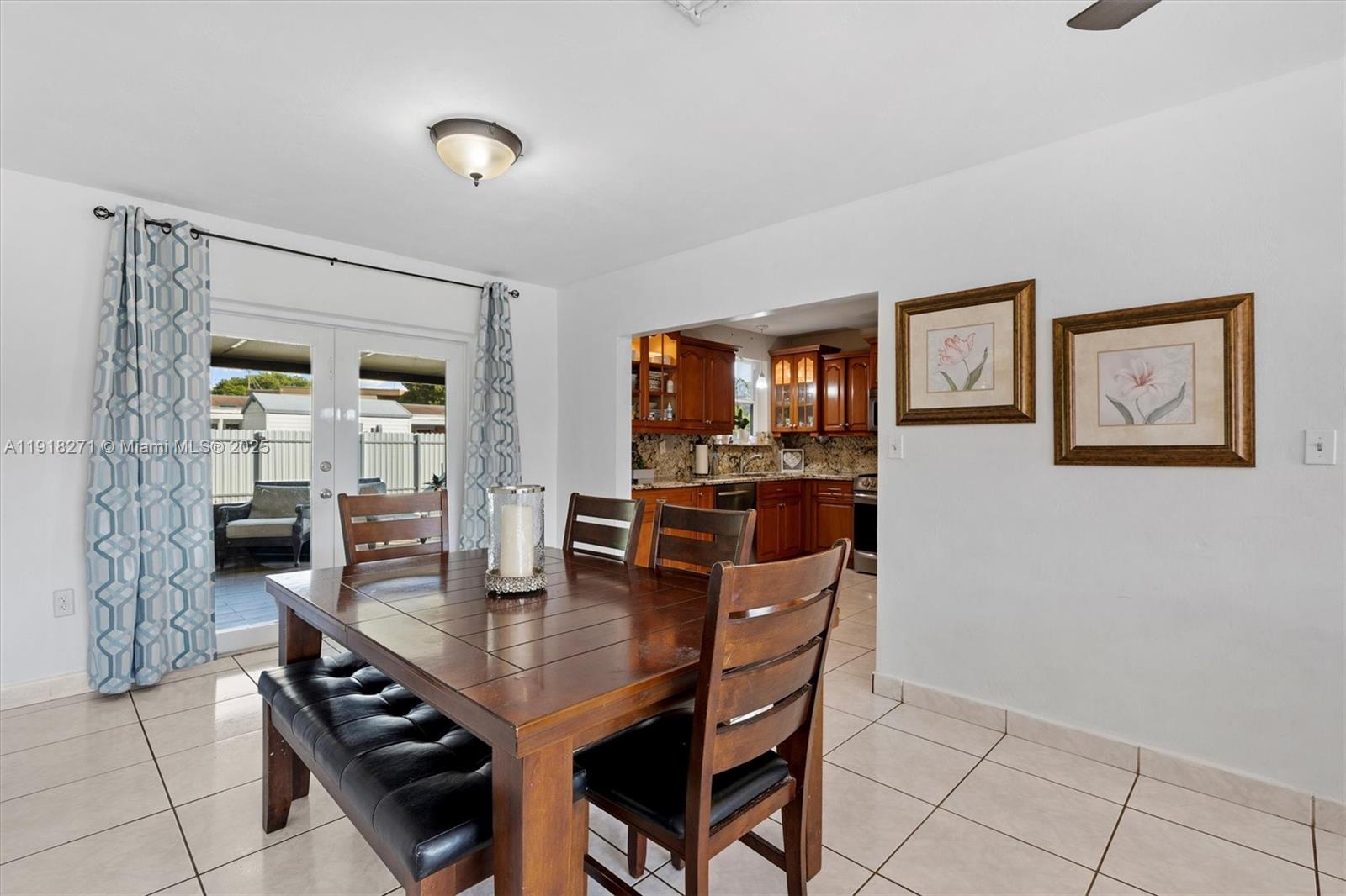 9411 Southwest 30th Terrace Miami, FL 33165 - Photo 7 of 42 a dining room with furniture and window
