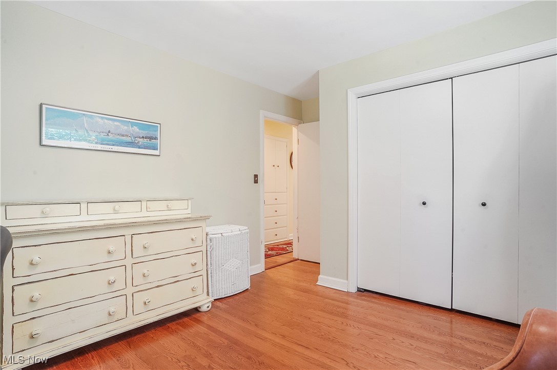 2441 Stockbridge Road Akron, OH 44313 - Photo 31 of 43 Bedroom with a closet and light hardwood / wood-style floors