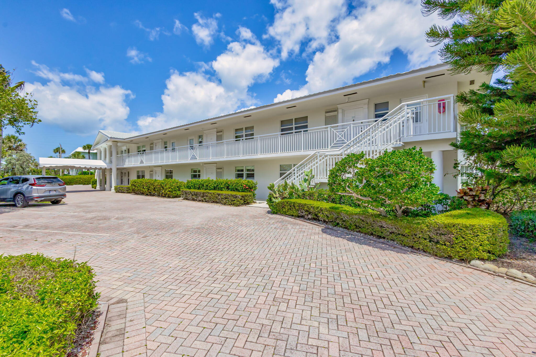 80 Celestial Way, Unit 213 Juno Beach, FL 33408 - Photo 11 of 59 Community Entrance