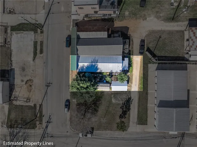 a aerial view of a house with a potted plant