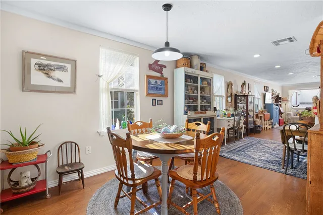a kitchen with stainless steel appliances granite countertop a sink and cabinets