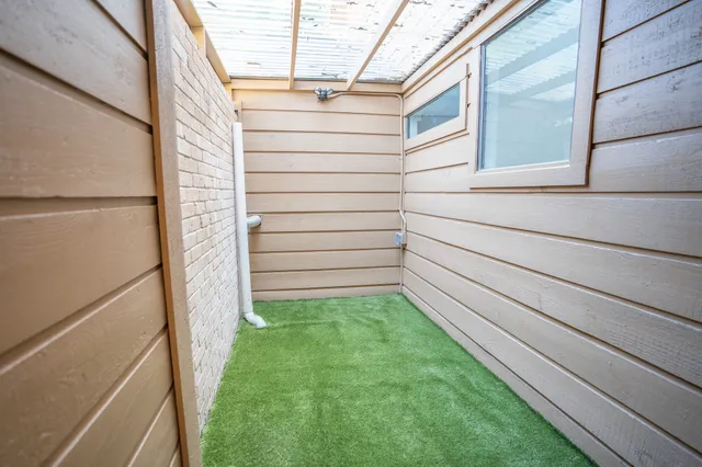 a view of a back yard of the house