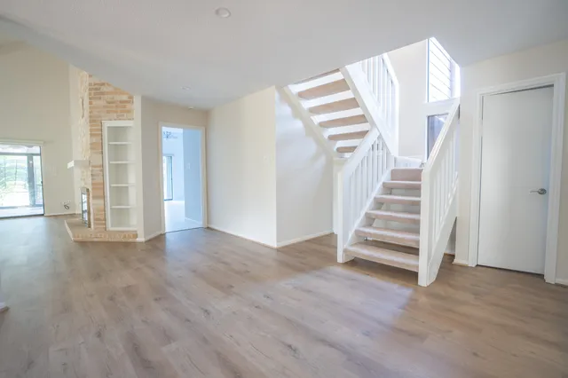 a view of entryway with wooden floor