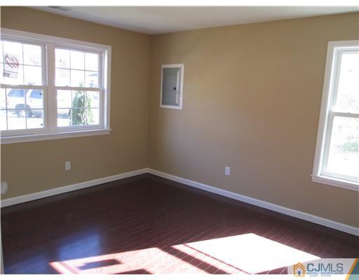 18 Colton Road Edison, NJ 08817 - Photo 4 of 10 a view of a window in an empty room