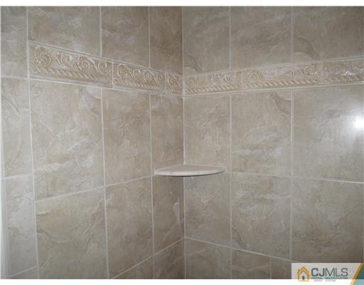 18 Colton Road Edison, NJ 08817 - Photo 6 of 10 a bathroom with a shower