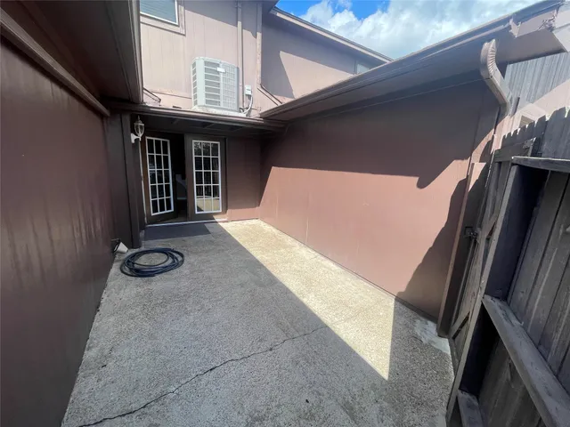 a view of a house with a yard porch and sitting area
