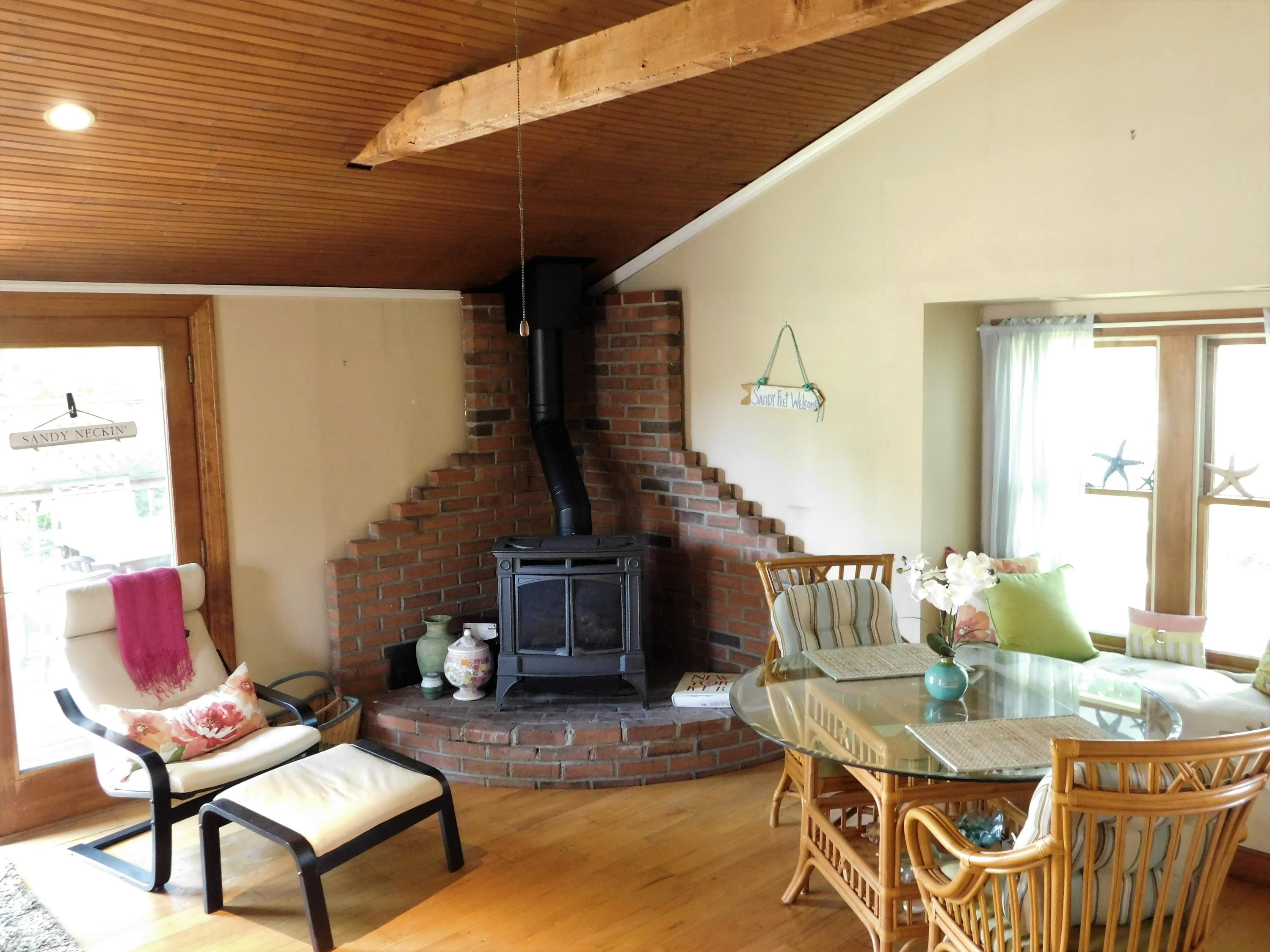 61 Harbor View Road Barnstable, MA 02630 - Photo 8 of 26 a living room with furniture and wooden floor