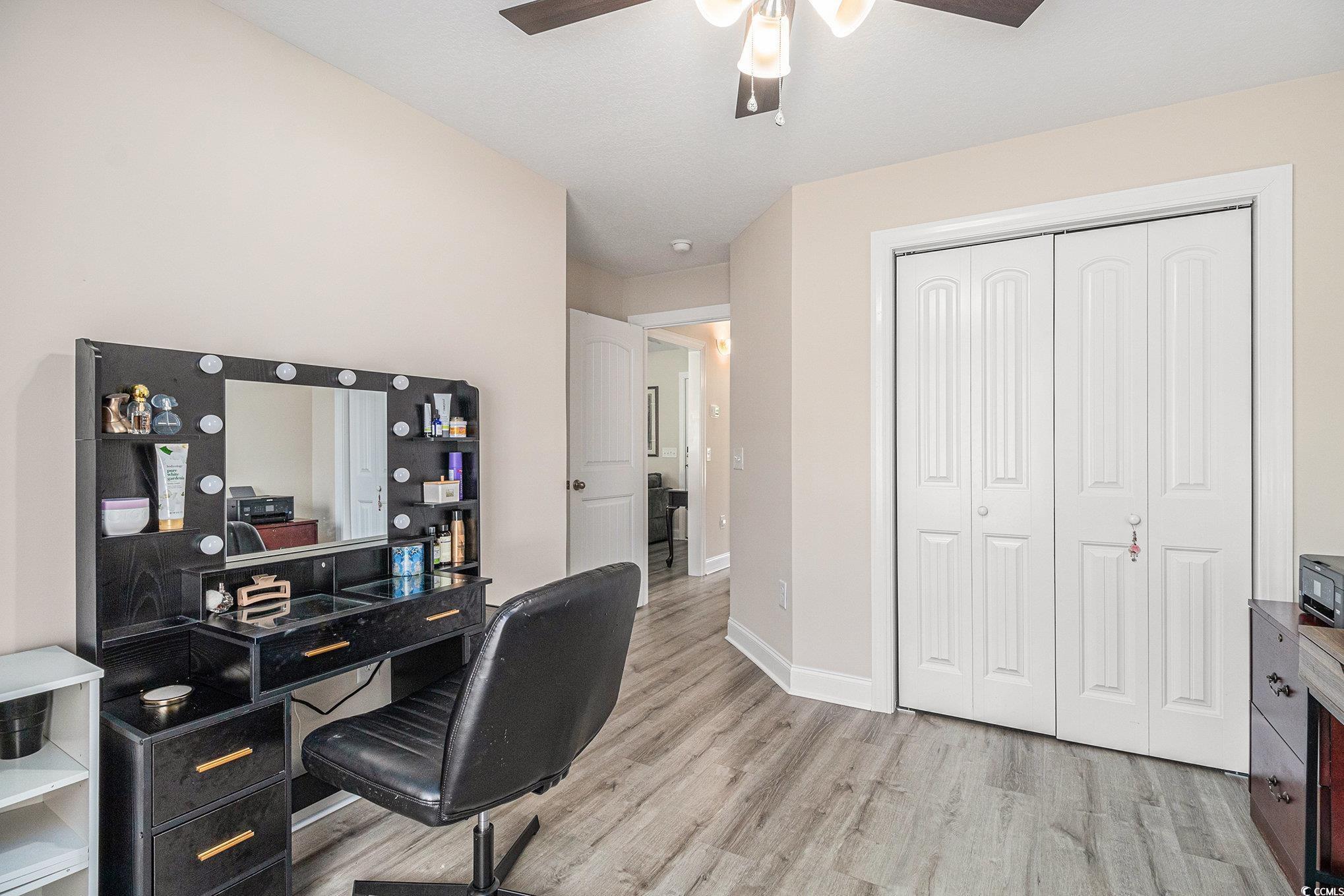 2521 Wise Road Conway, SC 29526 - Photo 11 of 20 Office area featuring a ceiling fan, light wood-style flooring, and baseboards