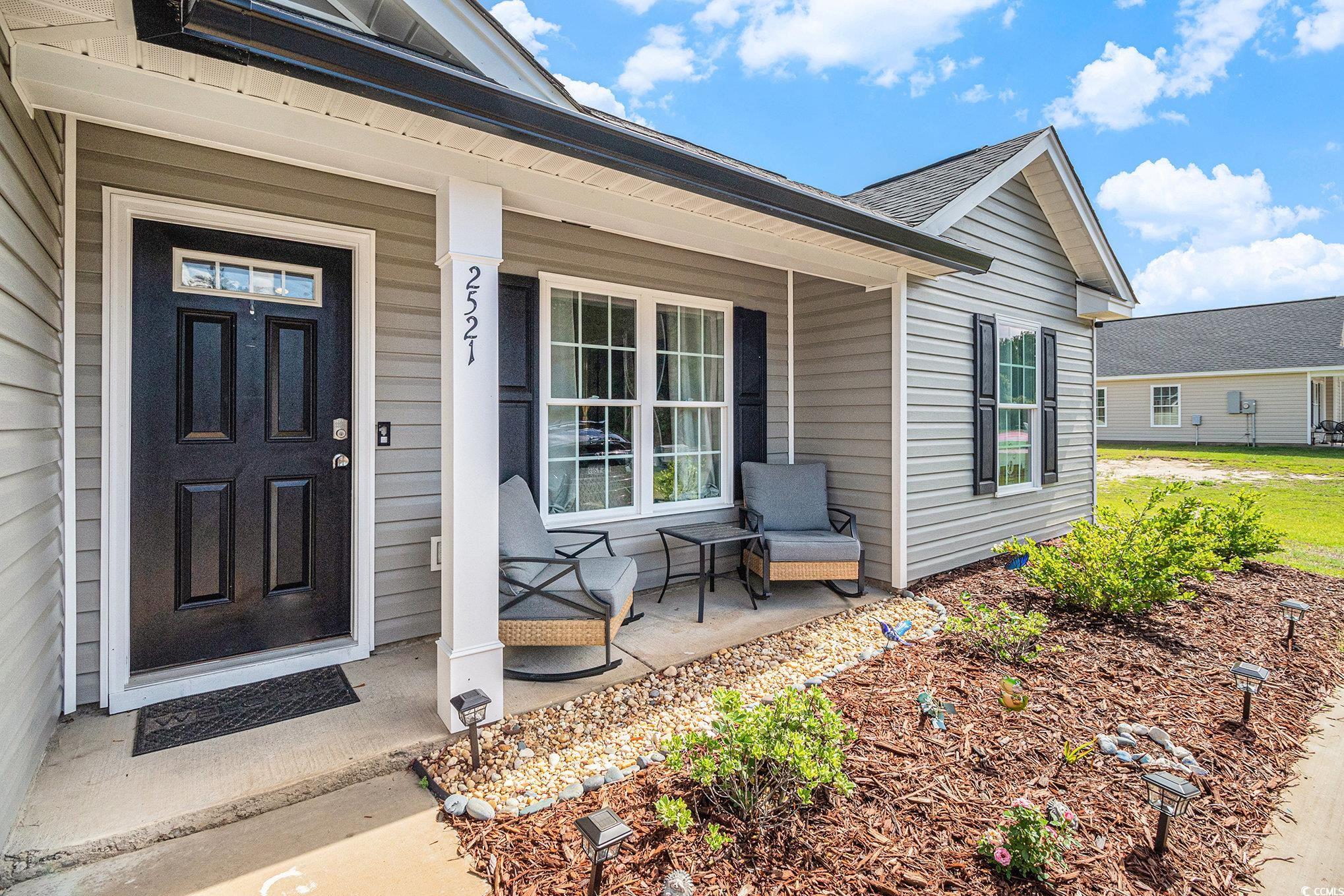 2521 Wise Road Conway, SC 29526 - Photo 3 of 20 Doorway to property with a porch