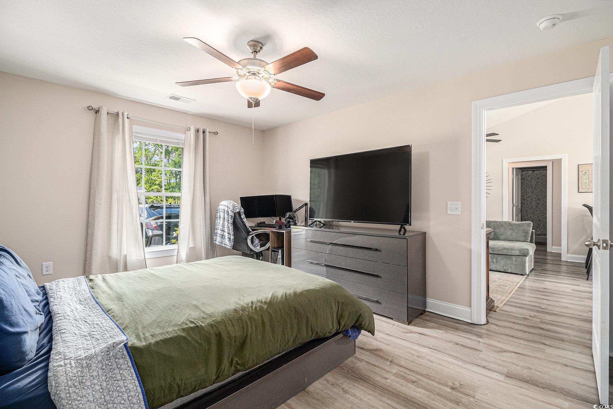 2521 Wise Road Conway, SC 29526 - Photo 9 of 20 Bedroom featuring wood finished floors, baseboards, and ceiling fan