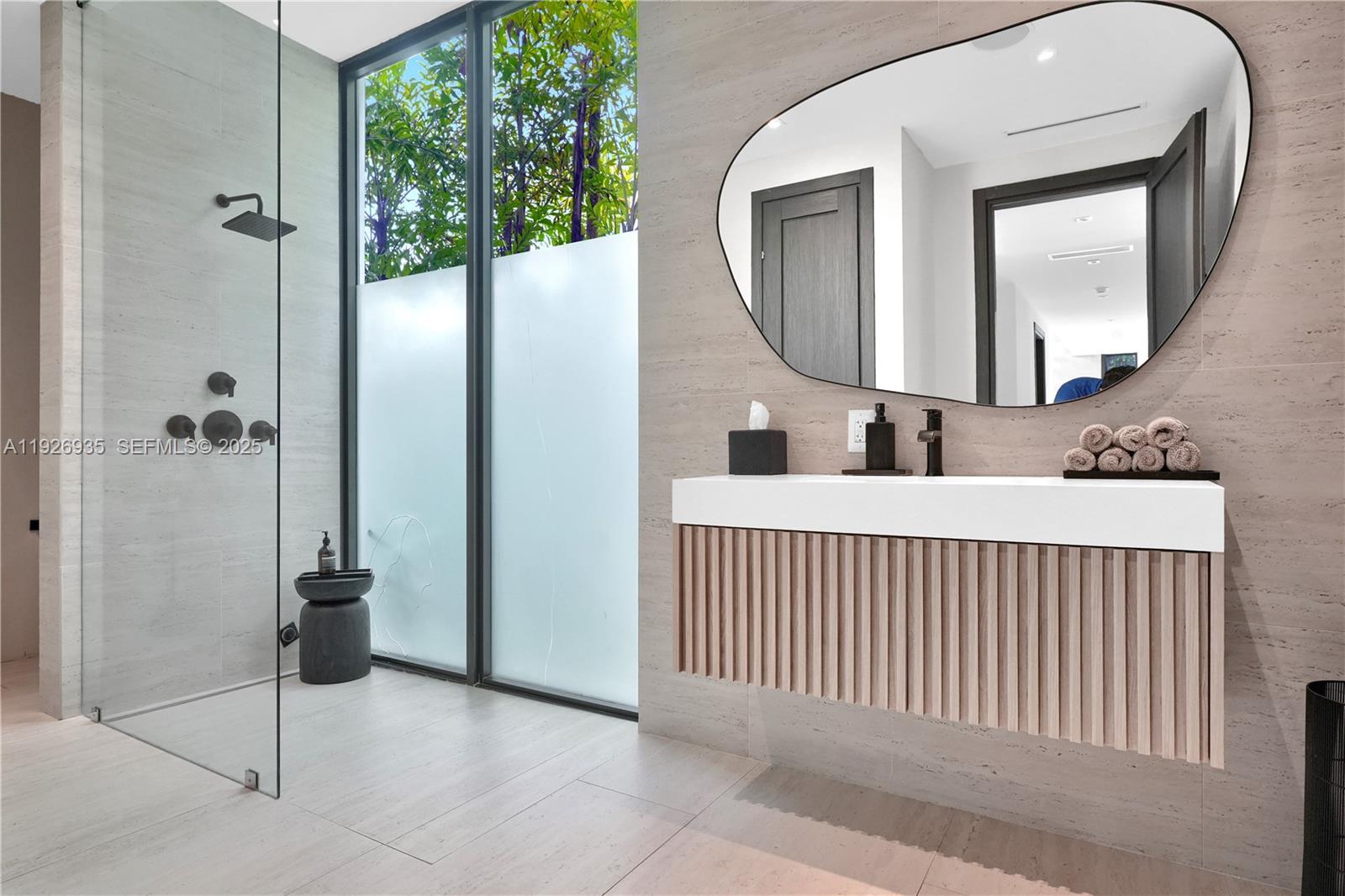 5501 Pine Tree Drive Miami Beach, FL 33140 - Photo 44 of 60 a view of a bathroom from a balcony