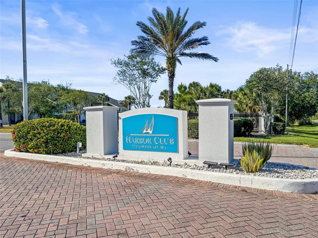 455 Alt 19, Unit 175 Palm Harbor, FL 34683 - Photo 27 of 35 a street sign on the side of a building