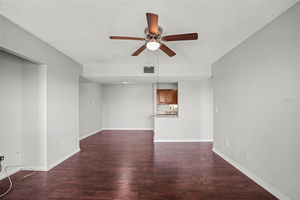 455 Alt 19, Unit 175 Palm Harbor, FL 34683 - Photo 8 of 35 a view of empty room with wooden floor