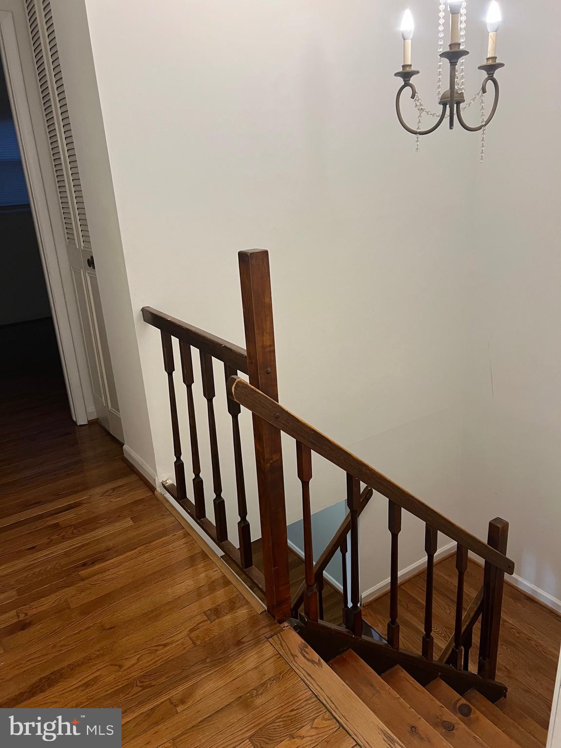 18804 Creeper Lane Gaithersburg, MD 20879 - Photo 3 of 20 a view of staircase with wooden floor and fan