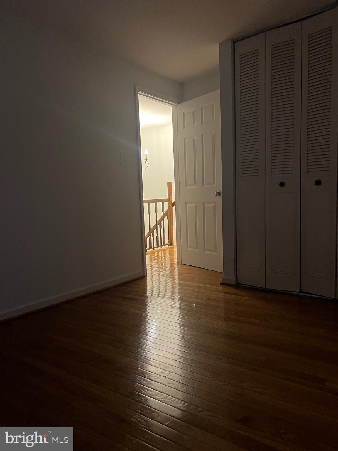 18804 Creeper Lane Gaithersburg, MD 20879 - Photo 8 of 20 a view of empty room with wooden floor