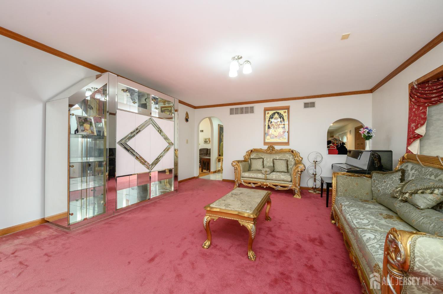 4 Drinking Brook Road Monmouth Junction, NJ 08852 - Photo 16 of 70 a living room with furniture and a dining table
