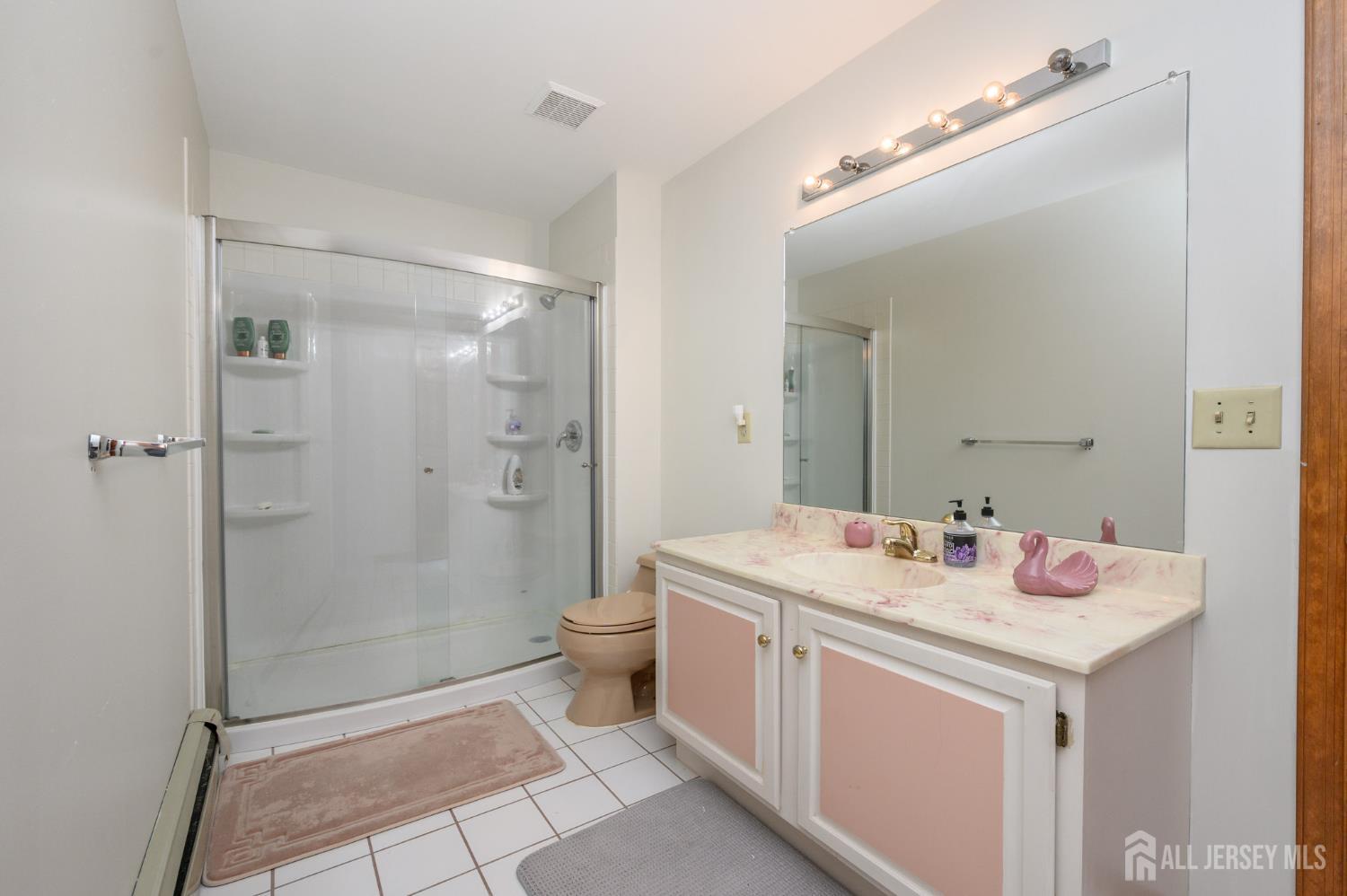 4 Drinking Brook Road Monmouth Junction, NJ 08852 - Photo 35 of 70 a bathroom with a sink toilet and shower