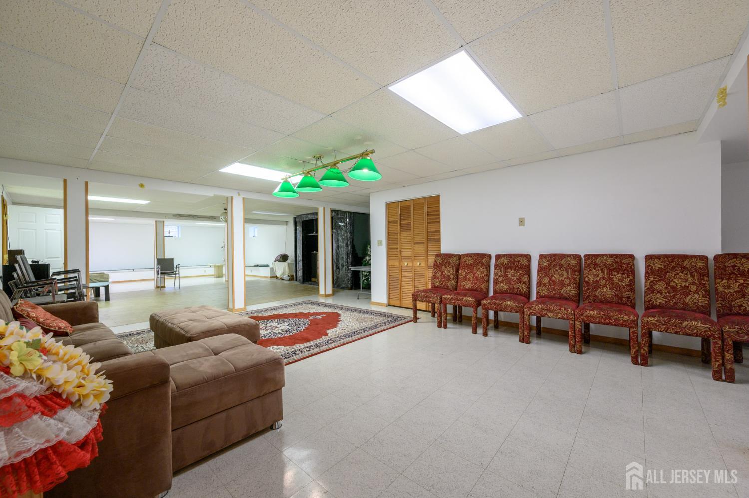 4 Drinking Brook Road Monmouth Junction, NJ 08852 - Photo 47 of 70 a living room with furniture and a large window