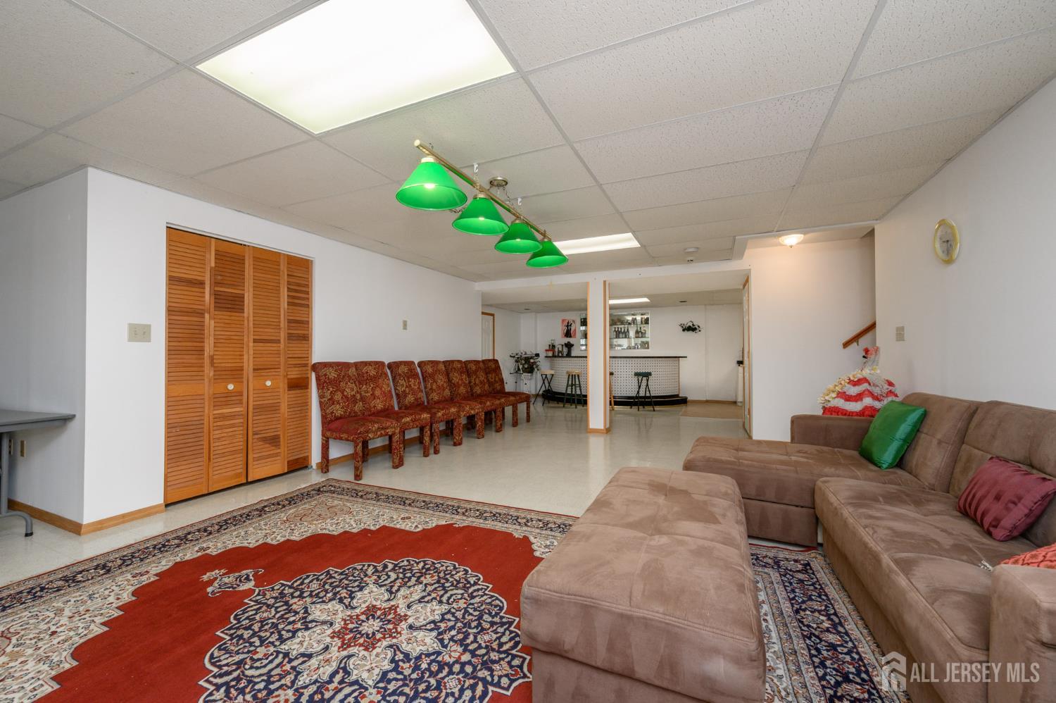 4 Drinking Brook Road Monmouth Junction, NJ 08852 - Photo 53 of 70 a living room with furniture and a dining table