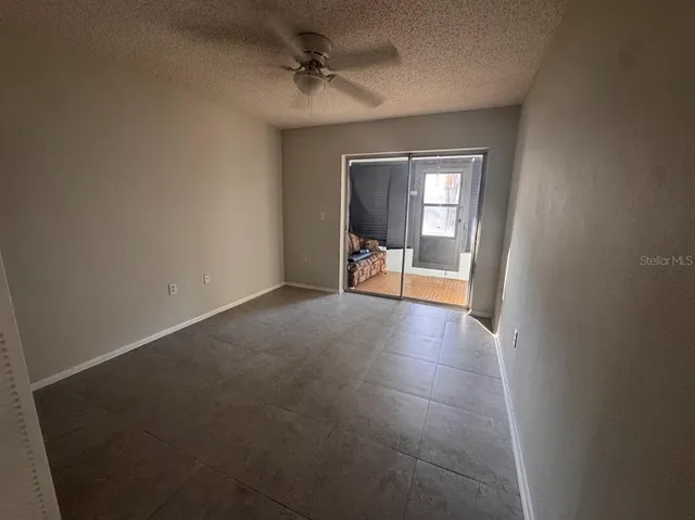 a view of a livingroom with a staircase
