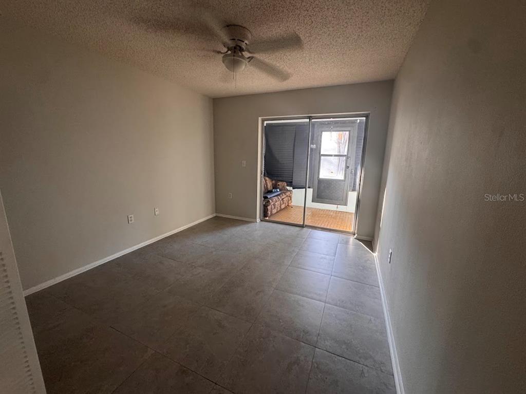 670 Green Valley Road, Unit F9 Palm Harbor, FL 34683 - Photo 17 of 22 a view of a livingroom with a staircase